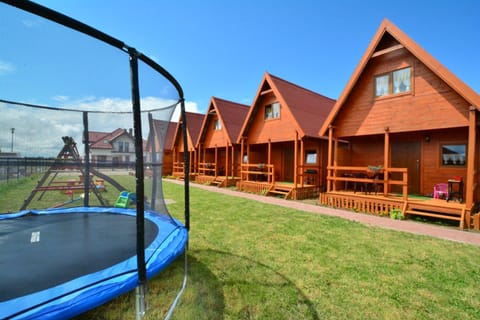 Morskie Chatki DOMKI Z 2 SYPIALNIAMI I SALON w USTRONIU MORSKIM House in West Pomeranian Voivodeship, Poland