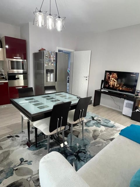 TV and multimedia, Kitchen or kitchenette, Living room, Seating area, Dining area, dishwasher, oven, stove