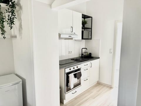 Kitchen or kitchenette, stove