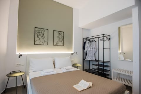 Bed, Photo of the whole room, Bedroom, towels, air conditioner