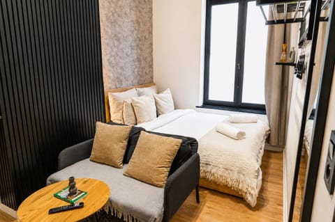 Bed, Seating area, Bedroom