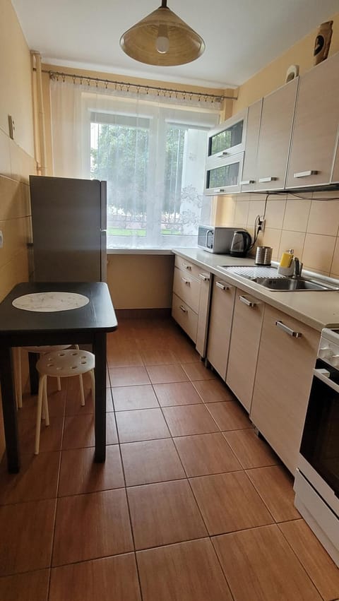 Kitchen or kitchenette, oven, stove