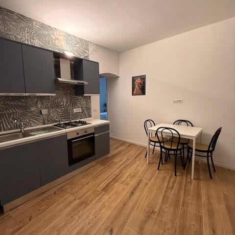 Kitchen or kitchenette, stove, air conditioner