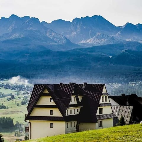 Property building, Nearby landmark, Day, Natural landscape, Mountain view