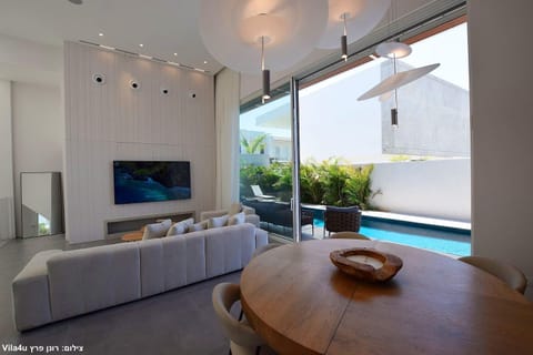View (from property/room), Seating area, Swimming pool