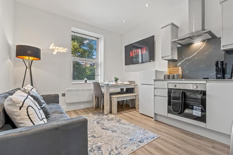 Kitchen or kitchenette, Living room, Seating area, Dining area, oven, stove, toaster