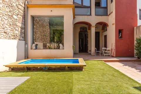 Property building, Living room, Swimming pool