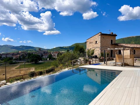 Property building, Natural landscape, Mountain view, Swimming pool, sunbed