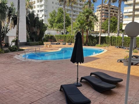 Swimming pool, sunbed