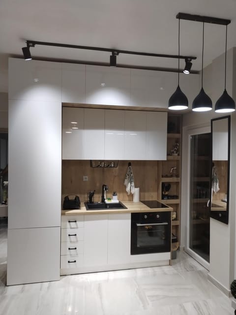 Kitchen or kitchenette, oven, stove