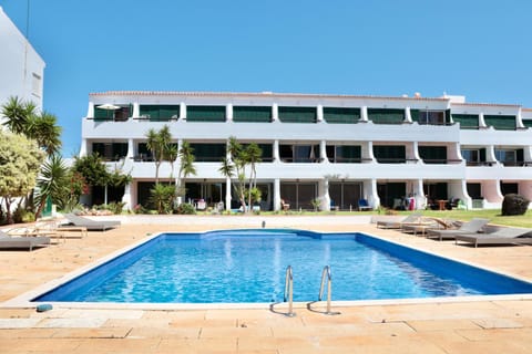 Property building, Pool view, Swimming pool, sunbed