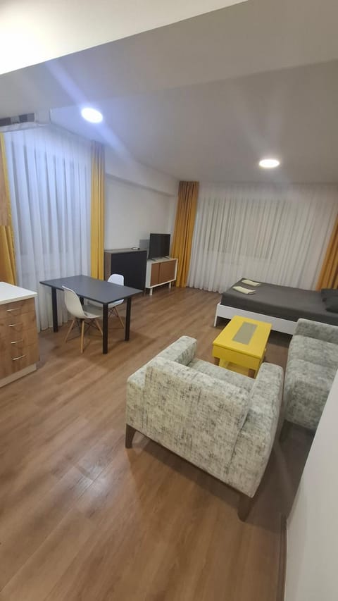 Bed, TV and multimedia, Living room, Photo of the whole room, Seating area, Bedroom