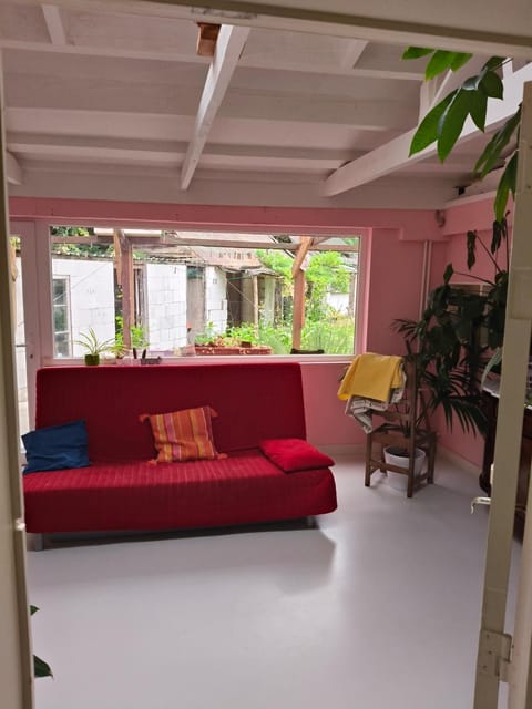 De roze kamer Apartment in Mol