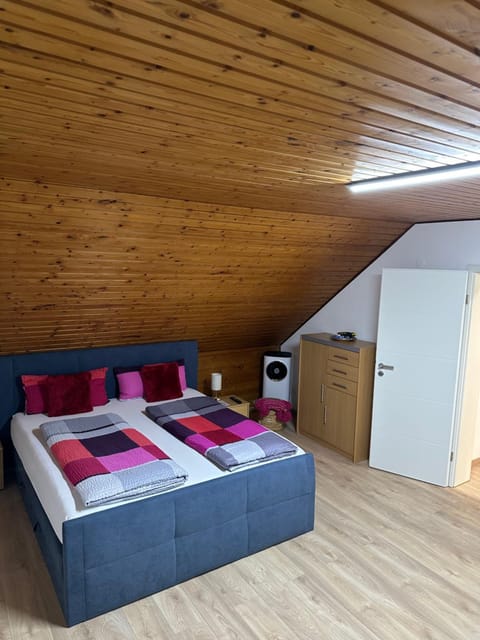 Bed, Living room, Seating area, Bedroom