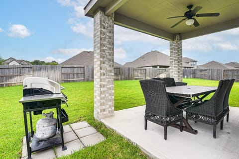 Grand Family Home with Patio and Fenced Yard in Arcola House in Pearland