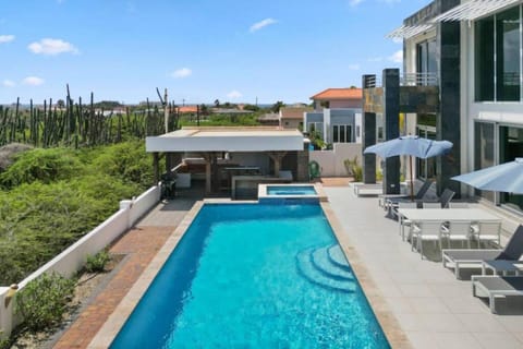 Property building, Patio, Pool view, sunbed