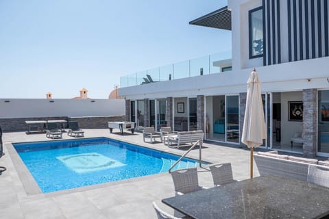 Property building, Patio, Day, Pool view, Swimming pool