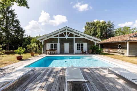 Property building, Living room, Swimming pool