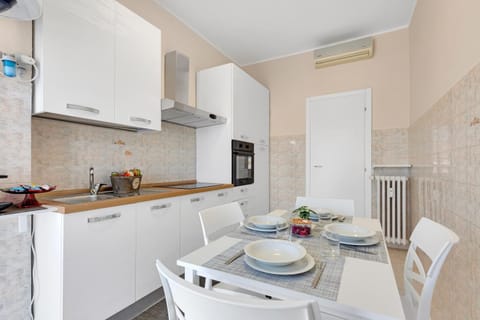 Kitchen or kitchenette, oven, stove, air conditioner