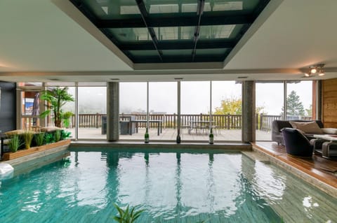 Property building, Living room, Swimming pool