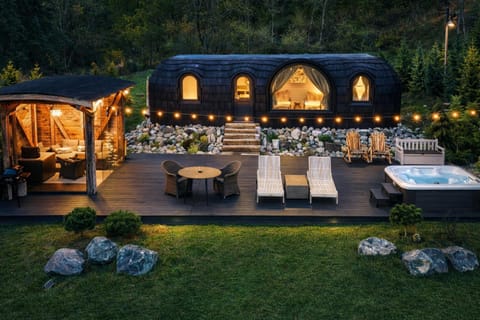 Property building, Patio, Night, Natural landscape, Seating area, Garden view
