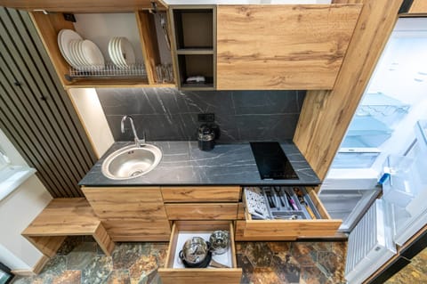 Kitchen or kitchenette, stove