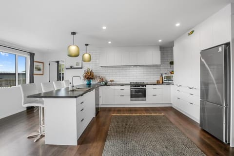 Kitchen or kitchenette, dishwasher, oven, stove