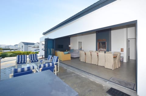 Property building, Patio, Seating area, fireplace