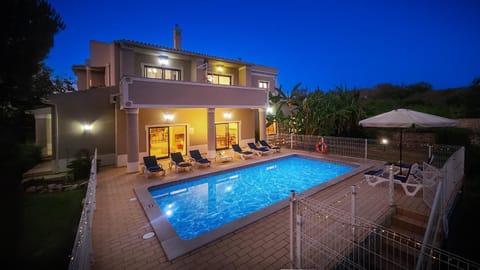 Night, Pool view, Swimming pool, sunbed