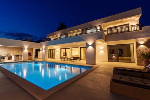 Property building, Night, Swimming pool