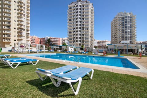 Property building, Living room, Swimming pool
