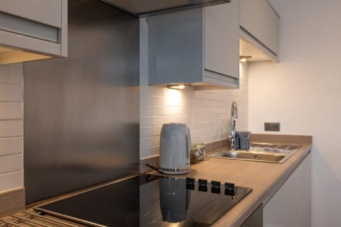 Kitchen or kitchenette, stove