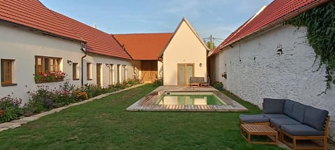 Property building, Patio, Summer, Garden, Seating area, Area and facilities, Swimming pool