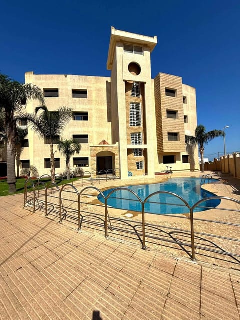 Property building, Balcony/Terrace, Pool view, Swimming pool