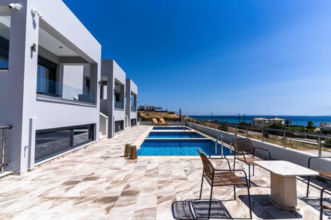 Property building, Patio, Natural landscape, View (from property/room), Balcony/Terrace, Pool view, Sea view, Swimming pool