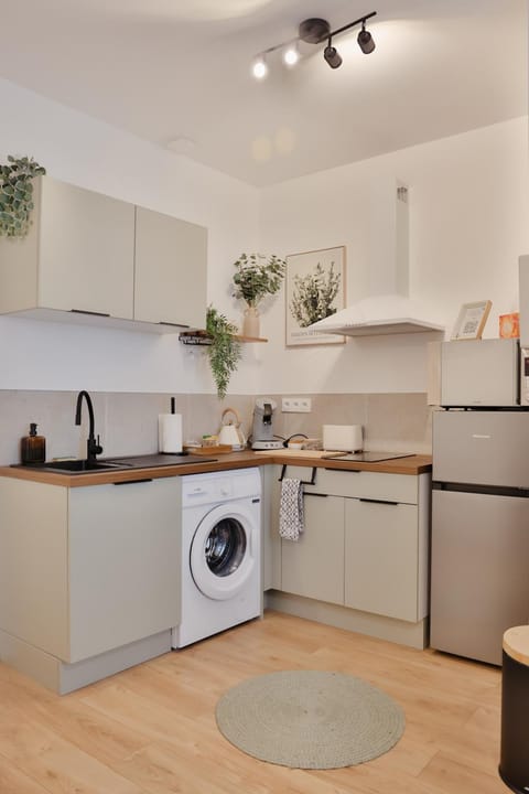 microwave, oven, stove, toaster, washing machine, kitchen