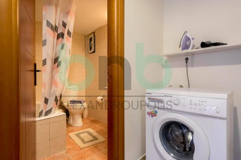 Bathroom, flat iron, hair dryier, washing machine