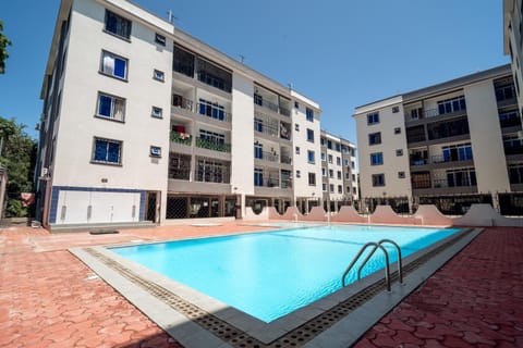 Property building, Day, Pool view, Swimming pool