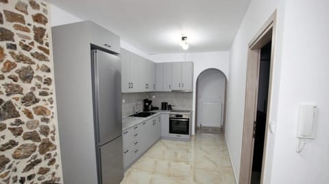 Kitchen or kitchenette, oven, stove