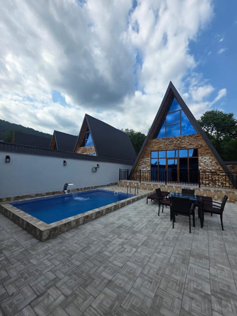 Property building, Natural landscape, Pool view, Swimming pool