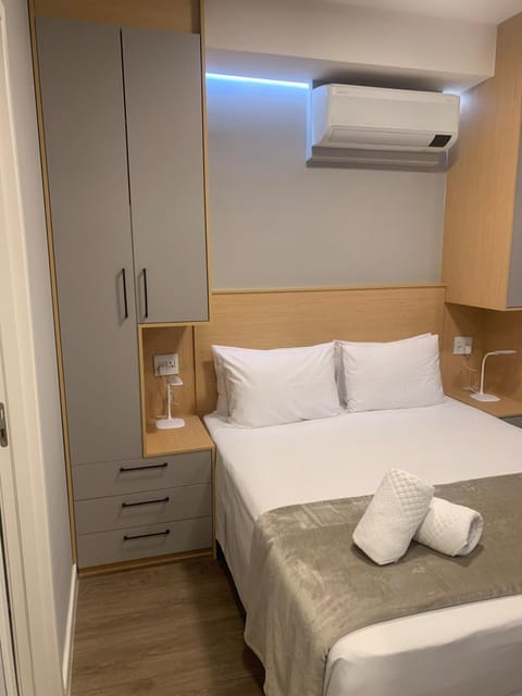 Bed, Photo of the whole room, Bedroom, towels, wardrobe, air conditioner