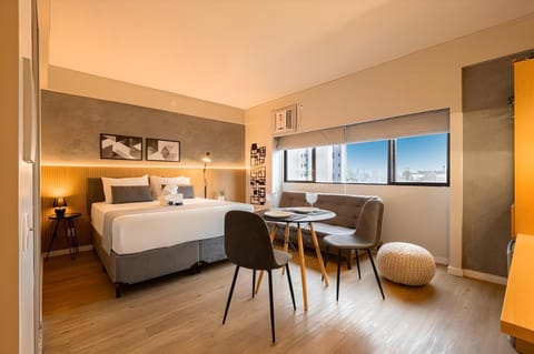 Bed, Kitchen or kitchenette, Dining area, Bedroom, air conditioner, air conditioner