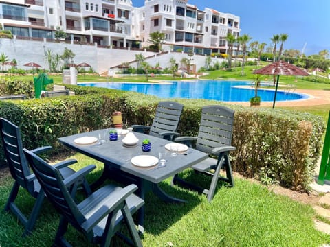 Patio, Dining area, Garden view, Swimming pool