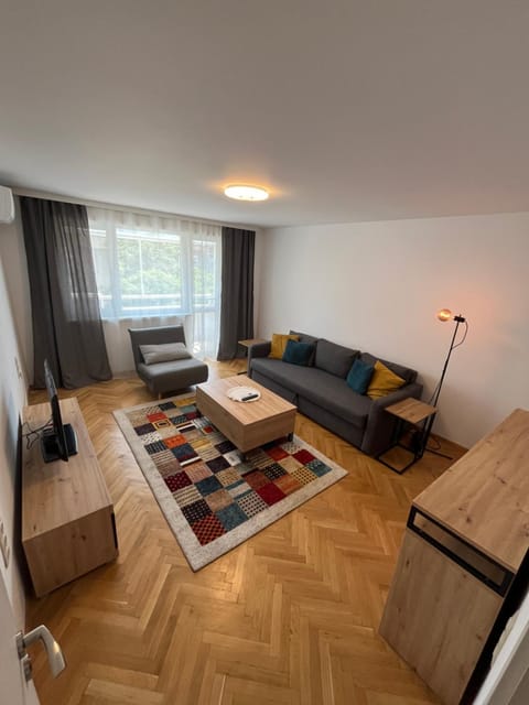 Communal lounge/ TV room, Bird's eye view, Balcony/Terrace, Balcony/Terrace, Living room, Seating area, Guests, Guests, Entertainment, group of guests, group of guests, internet, internet, air conditioner