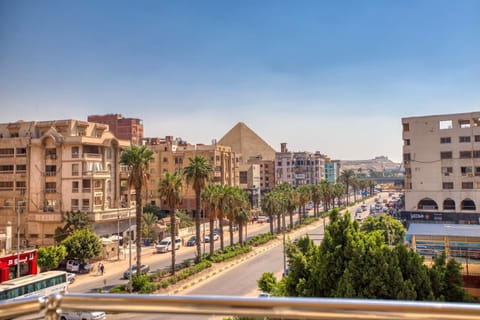 Property building, Day, Neighbourhood, Natural landscape, Bird's eye view, City view, Street view, Location, Parking