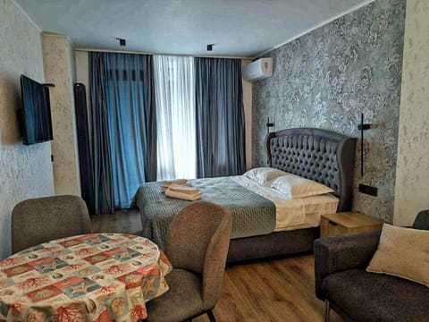 Bed, Seating area, Bedroom