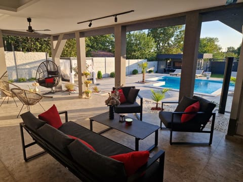 Patio, Day, Seating area, Evening entertainment, Pool view