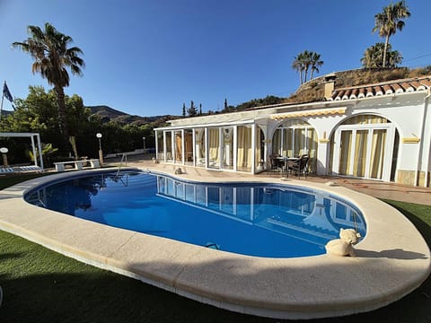 Property building, Living room, Swimming pool