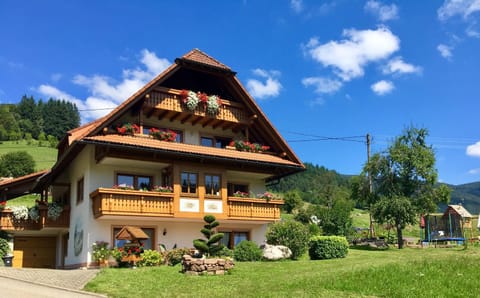 Property building, Day, Property logo or sign, Natural landscape, Garden, View (from property/room), Garden view