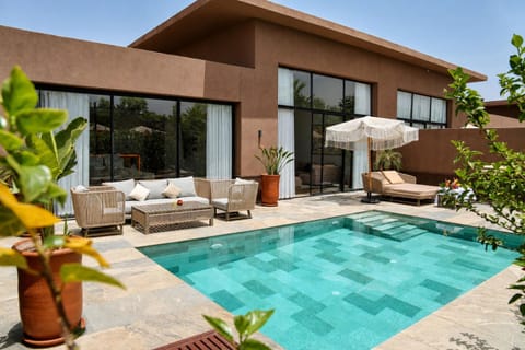 Property building, Patio, Day, Seating area, Garden view, Pool view, Swimming pool